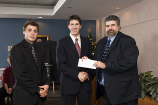 Robert Keleher and Simon Pearn receiving the top prize for their business plan, ARC Technology 