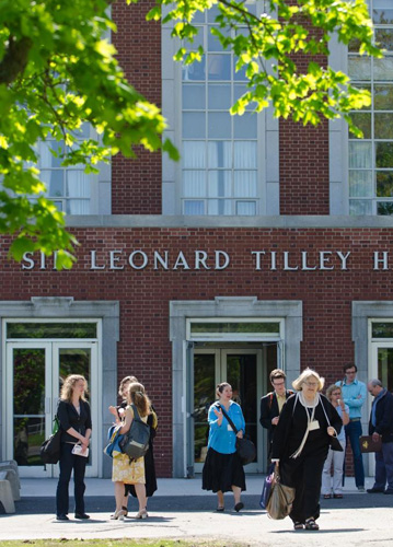 Delegates of Congress 2011 coming and going in front of Tilley Hall