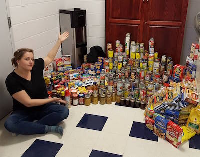 Fourth year BBA student Meghan Harper championed a food drive among students at UNB.