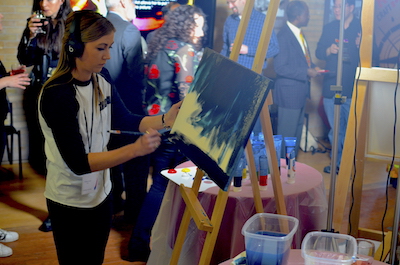 Artists participating in the fundraiser had 20 minutes to produce a painting with guests voting for their favourite at the end of each round. 