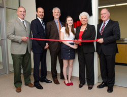 From left to right: Anthony Secco (vice-president Fredericton), Stephen Acker (son), Jamie Acker (son), Sydney Acker (granddaughter), Doe Acker (widow), and David Coleman (dean of engineering)  