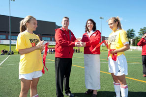 Meggie Spicer, women’s soccer player and BMO soccer award recipient; Eddy Campbell, UNB president; Christine Cooper, vice-president, New Brunswick and PEI, BMO; and Emily Sarty, women’s soccer player and BMO soccer award recipient.