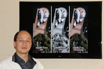 Dr. Yun Zhang is seen here standing in front of a before-and-after UNB PanSharp (fusion) image. UNB PanSharp technology and its global impact is one of the main reasons for Dr. Zhang's award. The low resolution colour and the high resolution black-and-white are original images from the QuickBird satellite.  The high resolution colour image is the result produced by UNB PanSharp.