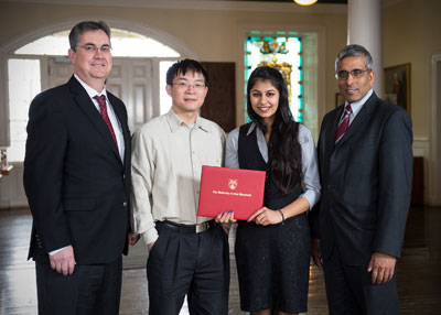 The first of many fellowship recipients was presented with a certificate of congratulations at the signing.  Left to right: Eddy Campbell, UNB President, Yonghao Ni, Director of Limerick Pulp and Paper Centre, Ishneet Kaur, Globalink Fellow, and Arvind Gupta, Mitacs CEO.