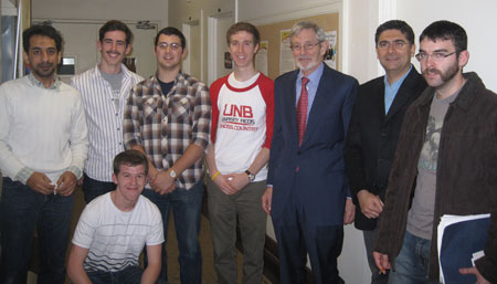 Participants from the lunch and learn speaker series event at UNB. L to R : Hassan AL-Hassawi, James Mullin, Tyler Mullin, Chris McNamara, Derek Oland, Mehrdad Kiani, Ian Fraser.  Alexander Mullin (kneeling).