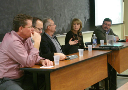 Panel members answer questions from UNB computer science students.