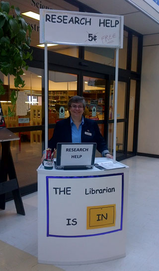 Judy MacLean is stationed at the 'Librarian is in' kiosk at the Science and Forestry Library, UNB Fredericton. 