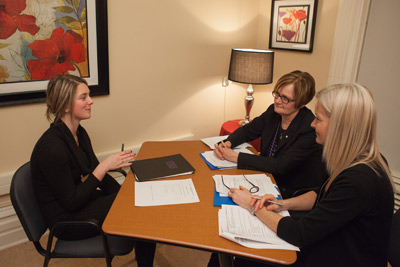 Cathlia Ward, 1st Year Renaissance College student (left) takes part in a mock interview with UNB Alumnae, Maia Deveau (right/front) and Carol Loughrey (right/back).