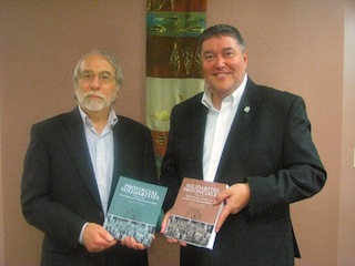 Dr. David Frank (left), history professor at the University of New Brunswick with Post-Secondary Education, Training and Labour Minister, Danny Soucy.