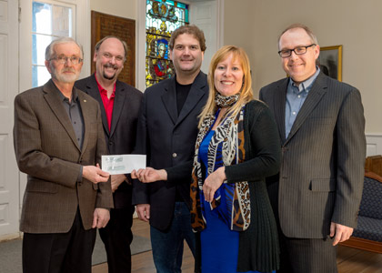 Dwight Ball (Executive Director, UNB Office of Research Services), David Burns (UNB Vice-President, Research) , Derrick Green (President & Chief Technology Officer, Green Imaging Technologies), Jill Green (CEO, Green Imaging Technologies), and David Foord (former UNB director of intellectual property)