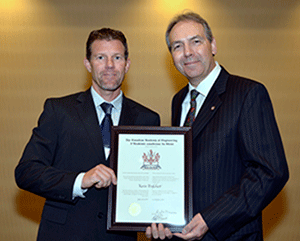 Kevin Englehart (left) being recognized at the CAE’s induction ceremony in Saint John’s, Nfld. June 26, 2014, with Richard J. Marceau, past president of the CAE