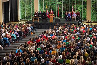 President Eddy Campbell welcomes students at Commencement ceremony in Fredericton