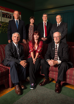Pictured are (front row, from left) Keith Bowman, Madison Rolfe, Rob Lutes (LLB '73) and (back row, from left) Jim Lutes, Barb MacDonald (BBA '78), President Eddy Campbell and John Lutes. 