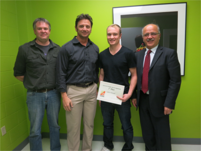 Left to right: Ryan Groom, founder of Trekkit; Mike LeBlanc, president and CEO BlueSpurs; Catlin O'Donnell, winner of CS Square Student Pitch Competition; and Ali Ghorbani, dean of UNB’s faculty of computer science 