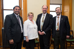 From left: Dhirendra Shukla, Director, J. Herbert Smith Centre; Francine Landry, Minister of Post-Secondary Education, Training and Labour; David Burns, Vice-President (Research) at UNB; and John Kershaw, Acting Associate Dean of Graduate Studies at UNB.