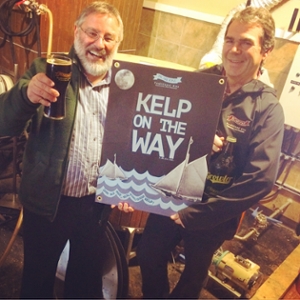 Thierry Chopin (Scientific Director of the Canadian Integrated Multi-Trophic Aquaculture Network (CIMTAN), based at the University of New Brunswick in Saint John), left, and Sean Dunbar (owner of Picaroons Traditional Ales, based in Fredericton), right, tasting the new beer “Kelp on the Way” made with organically certified kelps cultivated at an IMTA site of Cooke Aquaculture Inc. in the Bay of Fundy (photo credit: Dennis Goodwin).