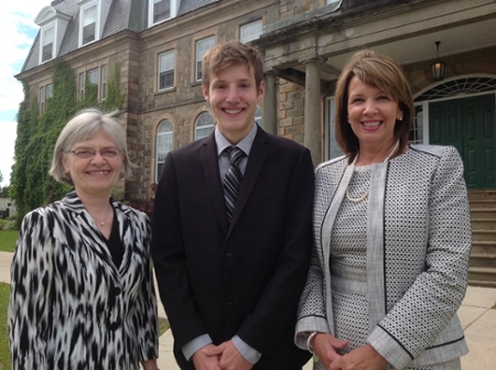 The first JDI NB Scholarship recipient, Jacob Wall, with Shirley Cleave, associate vice-president academic (learning environment) at UNB in Fredericton, left; and Colleen Baxter, vice-president human resources at JDI. 