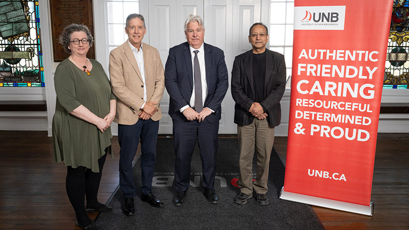 (L to R) Sue Blair, AUNBT lead negotiator; Van Lantz, UNB lead negotiator; Paul J. Mazerolle, UNB president and vice chancellor; Viqar Husain, AUNBT president