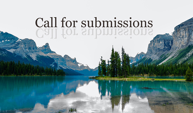 Photograph of a landscape with the words "call for submissions"