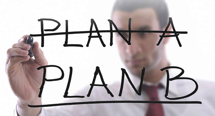 Image of a professional crossing out the words "Plan A" and underneath are the words "Plan B" 