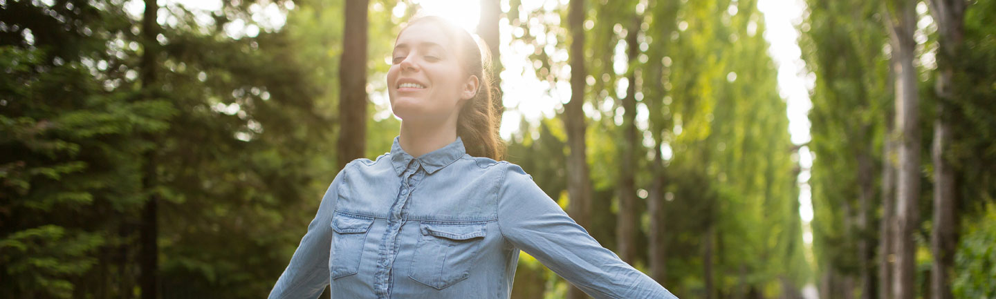 Woman taking a calming walk outside