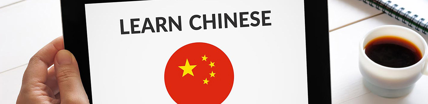 Photograph of a tablet with the words "Learn Chinese" on it