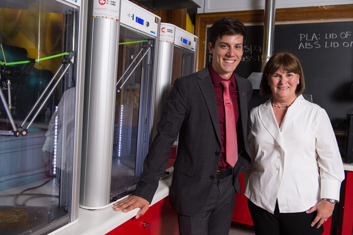 Edward Cyr, inaugural recipient of a McCain Foundation Postdoctoral Fellowship in Innovation at the University of New Brunswick, with Linda McCain, chair of The McCain Foundation. Dr. Cyr is working on futuristic applications in 3D printing. Credit: Cameron Fitch / Photo UNB.