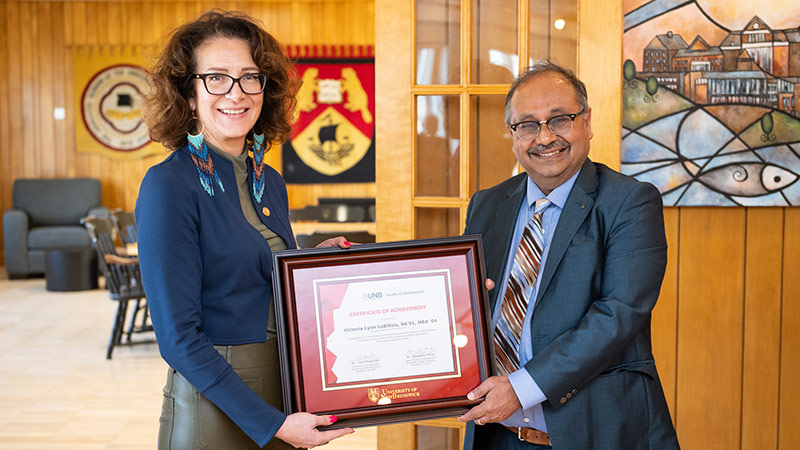 Victoria LaBillois and Devish Mitra, Dean of the Faculty of Management