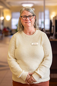 Tina Clarke, library assistant in the reference services unit at UNB Libraries. Photo credit: Brendan Mittelholtz